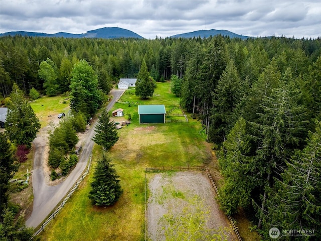760 Lewis Rd W, Seabeck, WA 98380 - view of subject property featuring a heavily wooded area and mountains