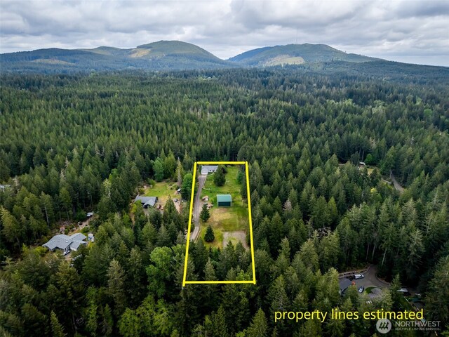 760 Lewis Rd W, Seabeck, WA 98380 - bird's eye view of a heavily wooded area and mountains