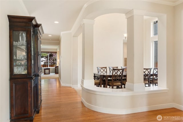 15927 35th Dr SE, Bothell, WA 98012 - hall with ornate columns, light wood-style flooring, arched walkways, crown molding, and recessed lighting