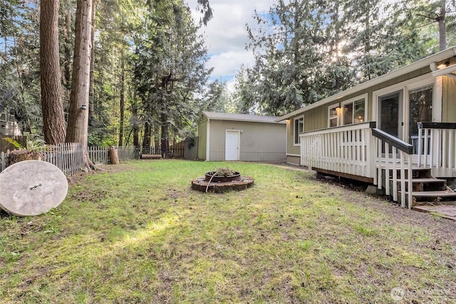 21843 SE Crest Ln SE, Yelm, WA 98597 - view of yard with an outdoor fire pit and a deck