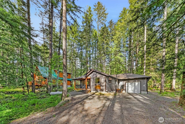 7468 Glacier Springs Dr, Deming, WA 98244 - view of front facade with driveway and a garage