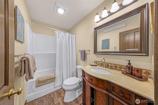 7468 Glacier Springs Dr, Deming, WA 98244 - full bath with wood finished floors, vanity, toilet, and shower / bath combo