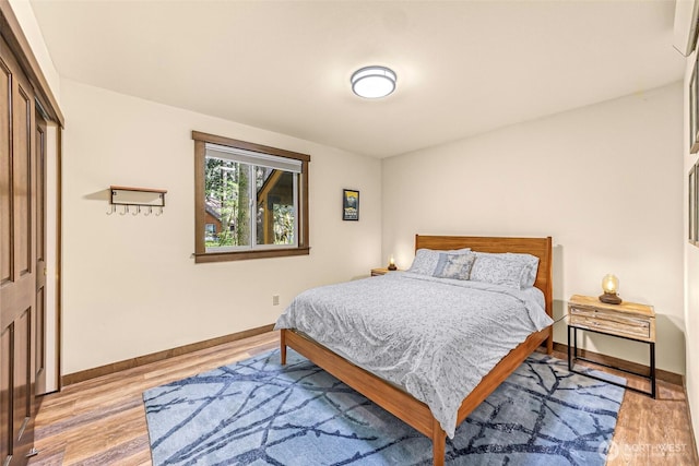7468 Glacier Springs Dr, Deming, WA 98244 - bedroom featuring baseboards, light wood finished floors, and a closet