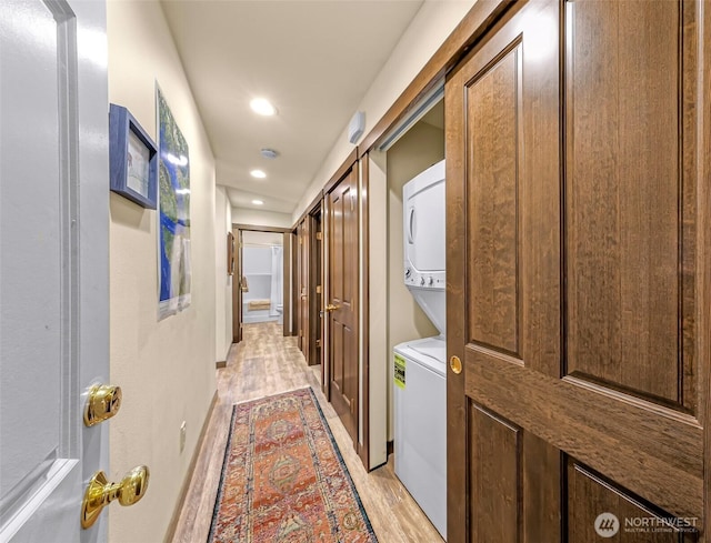 7468 Glacier Springs Dr, Deming, WA 98244 - corridor featuring stacked washer and clothes dryer, light wood-style flooring, and recessed lighting