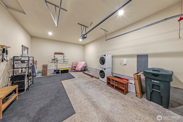 7468 Glacier Springs Dr, Deming, WA 98244 - garage with stacked washer / drying machine, a garage door opener, electric panel, and recessed lighting