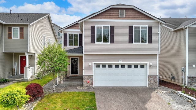 28843 213th Ct SE, Kent, WA 98042 - view of front of home with concrete driveway, a garage, and stone siding