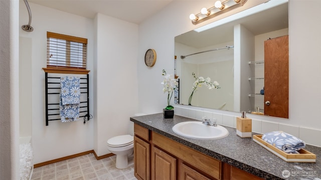 28843 213th Ct SE, Kent, WA 98042 - full bath with toilet, baseboards, a shower, and vanity