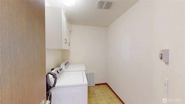 28843 213th Ct SE, Kent, WA 98042 - laundry room featuring washing machine and dryer, cabinet space, baseboards, and light floors