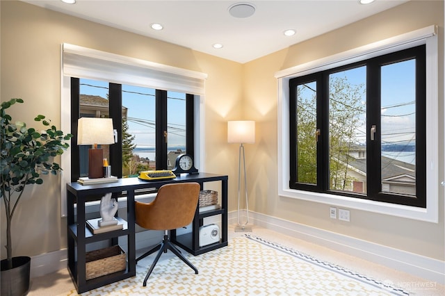 office with baseboards and recessed lighting
