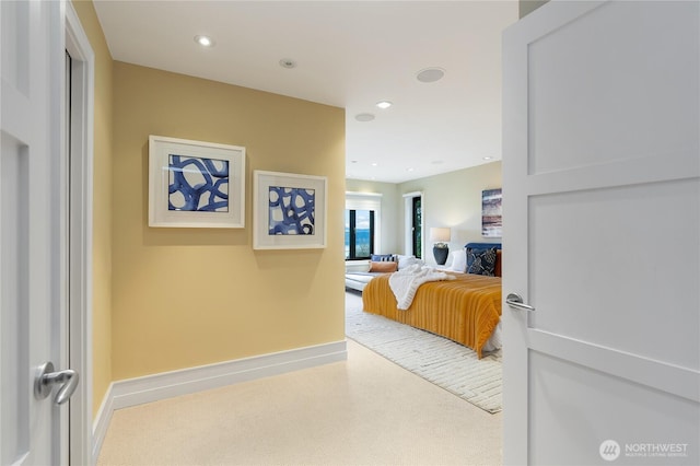 bedroom with baseboards and recessed lighting