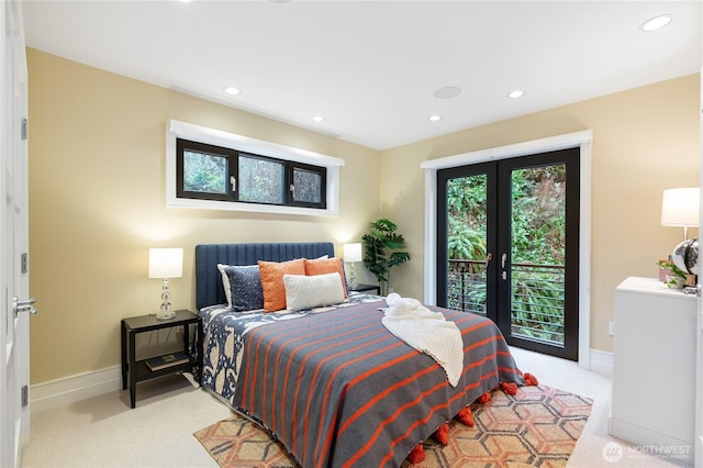 bedroom with light colored carpet, access to outside, baseboards, recessed lighting, and french doors