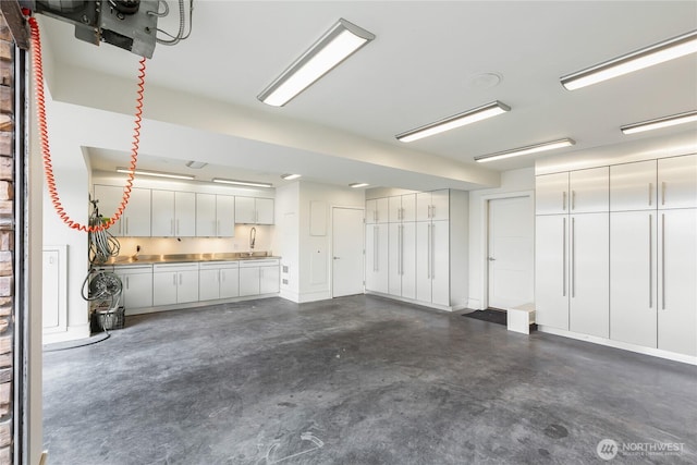 garage featuring a sink