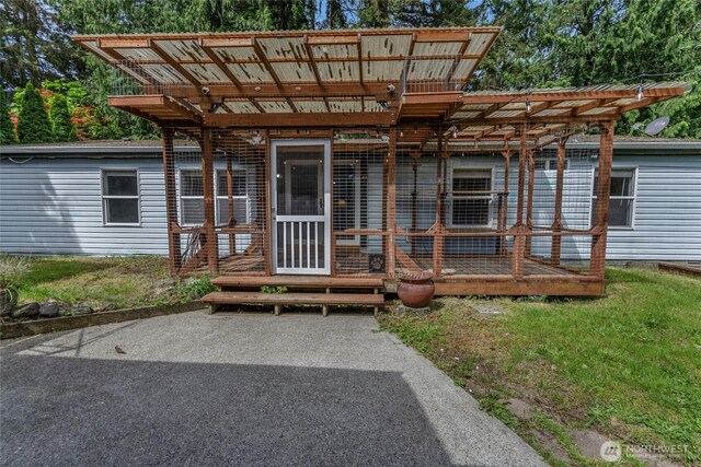 view of front of house featuring a pergola
