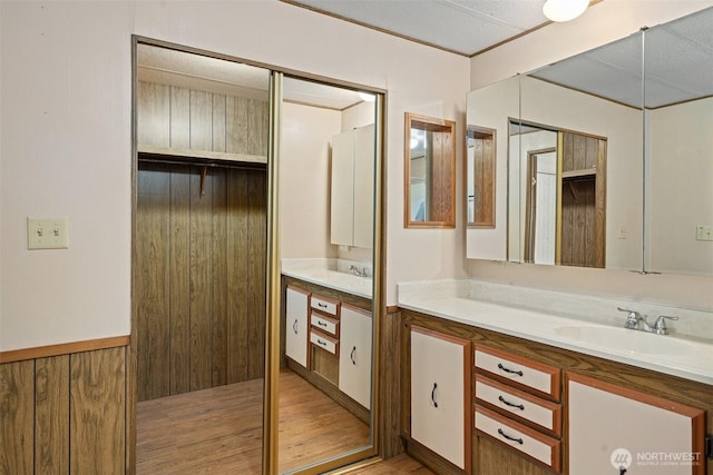 3180 Woodcock Rd, Sequim, WA 98382 - bathroom featuring vanity and wood finished floors