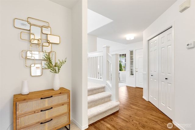 28132 24th Pl S, Federal Way, WA 98003 - entrance foyer featuring stairway, wood finished floors, and baseboards