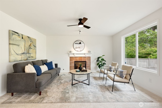 28132 24th Pl S, Federal Way, WA 98003 - carpeted living room with ceiling fan, a tile fireplace, and baseboards