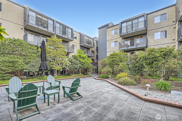 surrounding community featuring a patio area