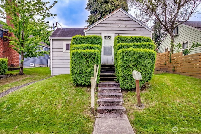 bungalow-style house featuring entry steps