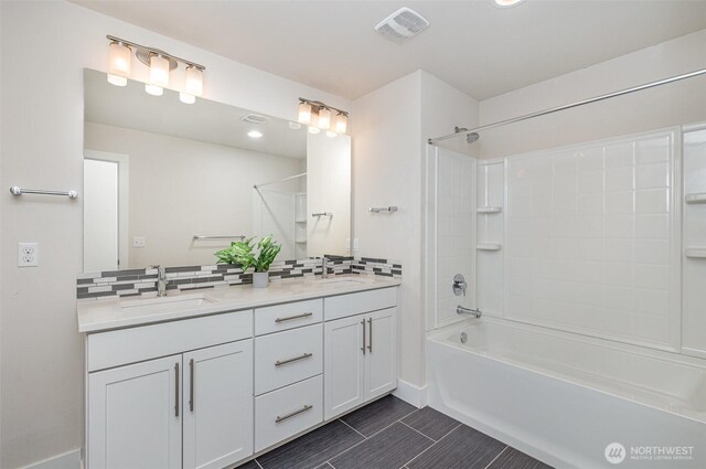 full bathroom featuring decorative backsplash, double vanity, bathing tub / shower combination, and recessed lighting