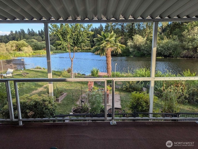water view featuring a tree filled landscape