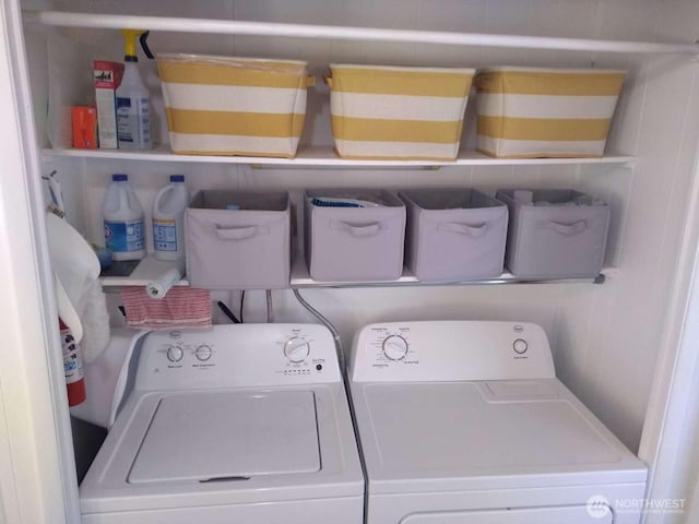 washroom with independent washer and dryer