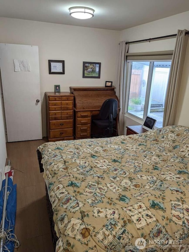 bedroom featuring wood finished floors