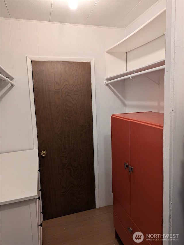 7301 NE 175th St Unit 140, Kenmore, WA 98028 - laundry room featuring wood finished floors