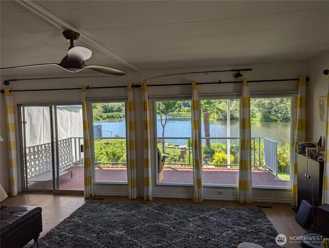 7301 NE 175th St Unit 140, Kenmore, WA 98028 - doorway to outside with a water view and wood finished floors