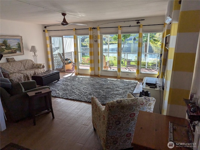 7301 NE 175th St Unit 140, Kenmore, WA 98028 - living area featuring wood finished floors, plenty of natural light, and ceiling fan