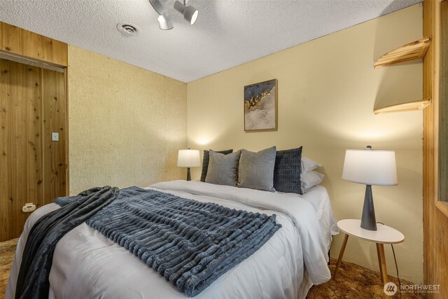 bedroom with a textured ceiling