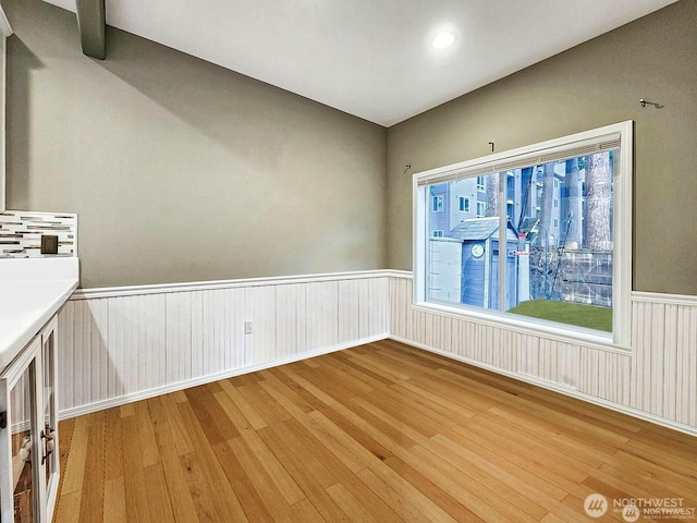 2332 130th Pl SE, Everett, WA 98208 - empty room featuring light wood-style flooring, a wainscoted wall, and recessed lighting