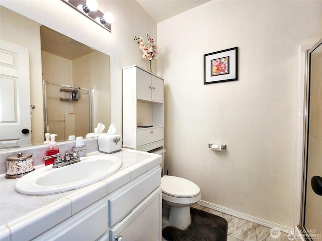 2332 130th Pl SE, Everett, WA 98208 - bathroom featuring a stall shower, toilet, vanity, baseboards, and marble look tiles