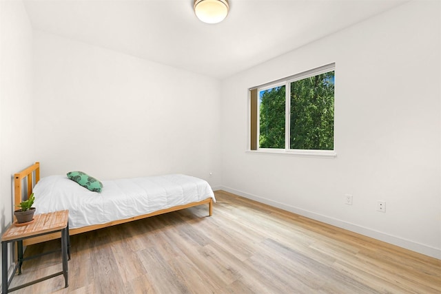 132 Sudden Valley Dr, Bellingham, WA 98229 - bedroom featuring baseboards and wood finished floors