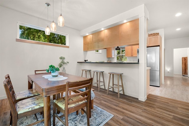 132 Sudden Valley Dr, Bellingham, WA 98229 - dining space with plenty of natural light, recessed lighting, wood finished floors, and baseboards