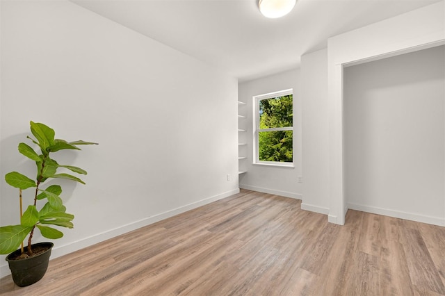 132 Sudden Valley Dr, Bellingham, WA 98229 - spare room with wood finished floors and baseboards