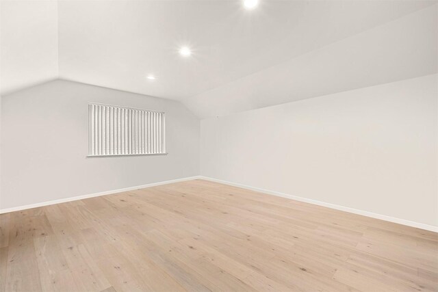 132 Sudden Valley Dr, Bellingham, WA 98229 - additional living space featuring lofted ceiling, baseboards, light wood-style flooring, and recessed lighting