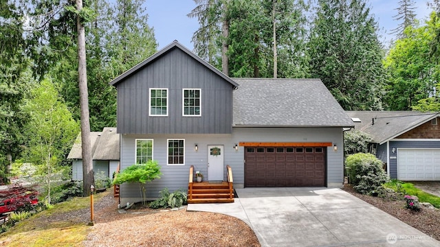 132 Sudden Valley Dr, Bellingham, WA 98229 - view of front of house with driveway, roof with shingles, and a garage