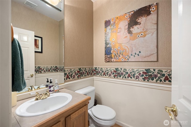 9437 NE Coral Ct, Bainbridge Island, WA 98110 - bathroom featuring toilet and vanity