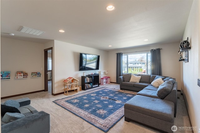 living area featuring carpet flooring, recessed lighting, and baseboards