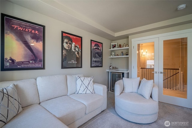 4213 Caddyshack Dr NE, Lacey, WA 98516 - living room with carpet floors, beverage cooler, a dry bar, french doors, and built in shelves