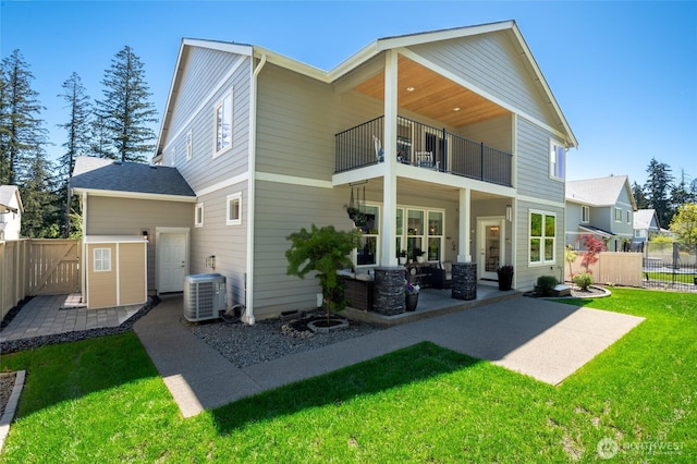 4213 Caddyshack Dr NE, Lacey, WA 98516 - back of property with a balcony, a patio, and central AC
