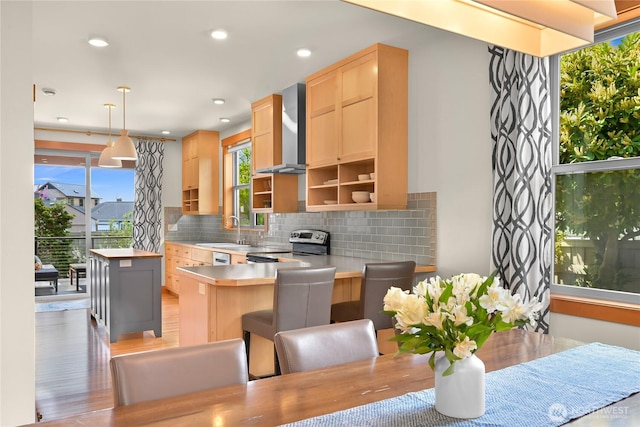 2518 S Park Dr, Bellingham, WA 98225 - kitchen featuring wall chimney exhaust hood, light brown cabinetry, a sink, stainless steel electric range oven, and backsplash