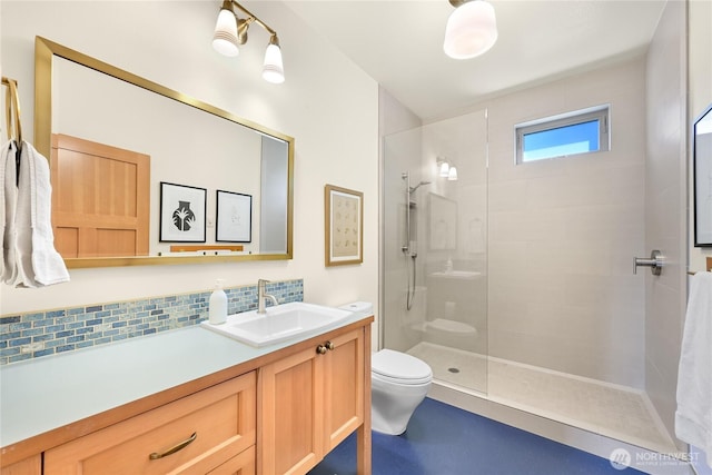 2518 S Park Dr, Bellingham, WA 98225 - full bath with a tile shower, toilet, vanity, and tasteful backsplash