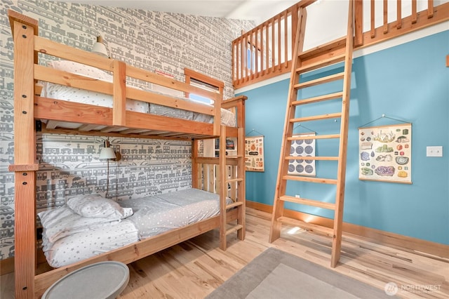 2518 S Park Dr, Bellingham, WA 98225 - bedroom with wood finished floors, a high ceiling, and baseboards