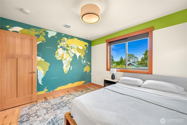 2518 S Park Dr, Bellingham, WA 98225 - bedroom featuring wood finished floors and baseboards