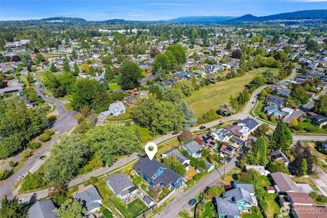 2518 S Park Dr, Bellingham, WA 98225 - aerial overview of property's location with nearby suburban area and a mountain backdrop