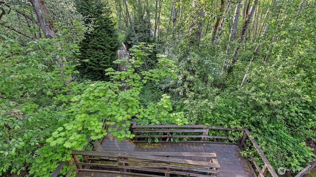view of home's community with a wooden deck