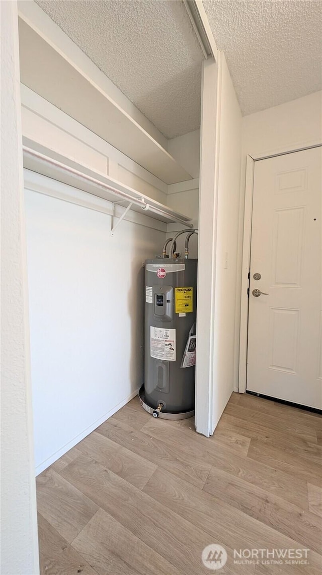 10459 Des Moinesmemorial Dr S Unit N-301, Seattle, WA 98168 - utility room with water heater