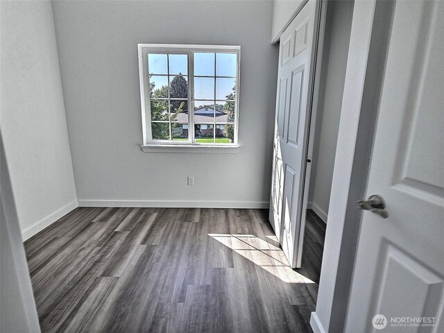 408-410 E 4th St, Warden, WA 98857 - unfurnished bedroom with wood finished floors and baseboards