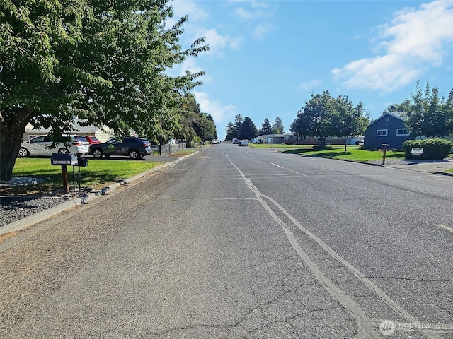 408-410 E 4th St, Warden, WA 98857 - view of asphalt street featuring curbs